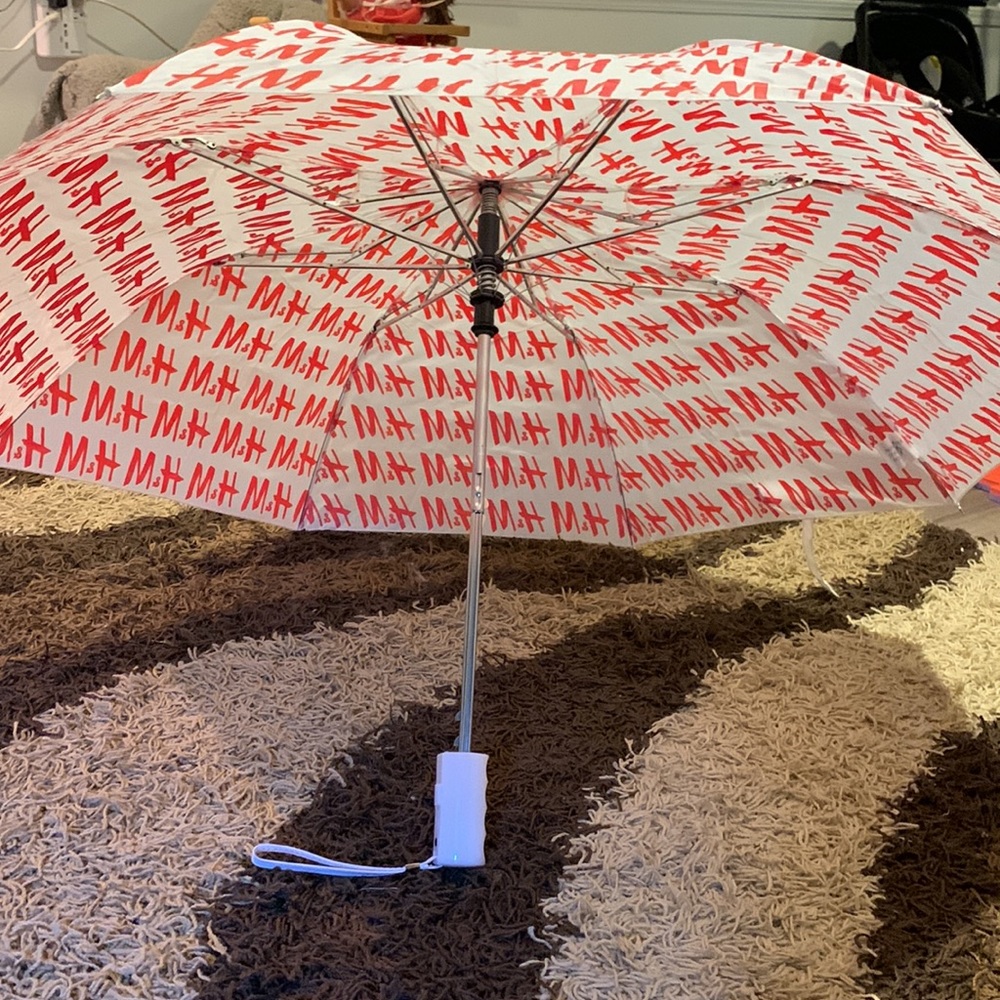 H&M umbrella red and white, super cute. White strap. Easy push open